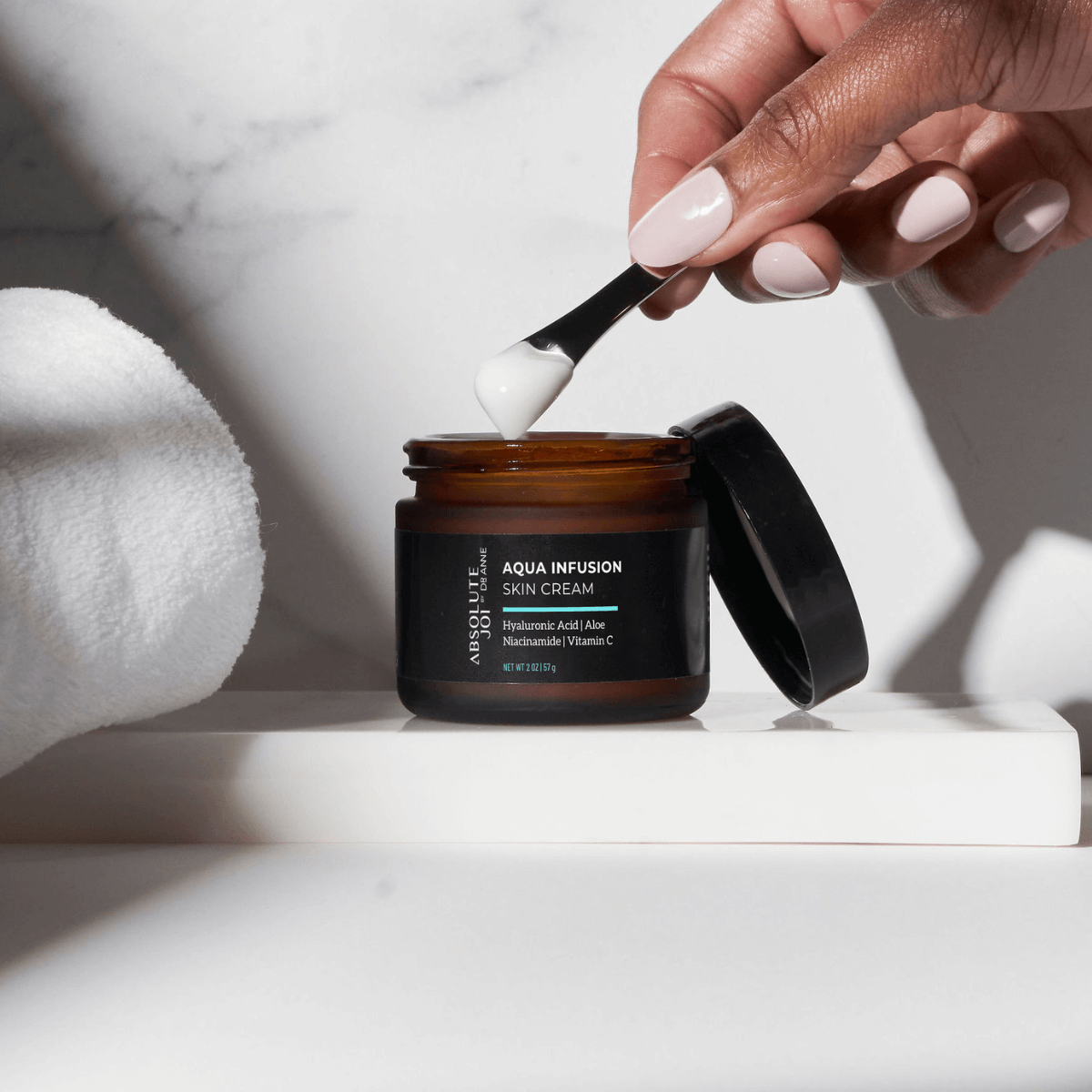 Get ready for your skin-renewing journey with our moisturizing Aqua Infusion Skin Cream. This isn't just another moisturizer – it's a game-changer for dewy, juicy skin. Fast-absorbing and non-greasy, while locking in moisture and hydration with squalane,