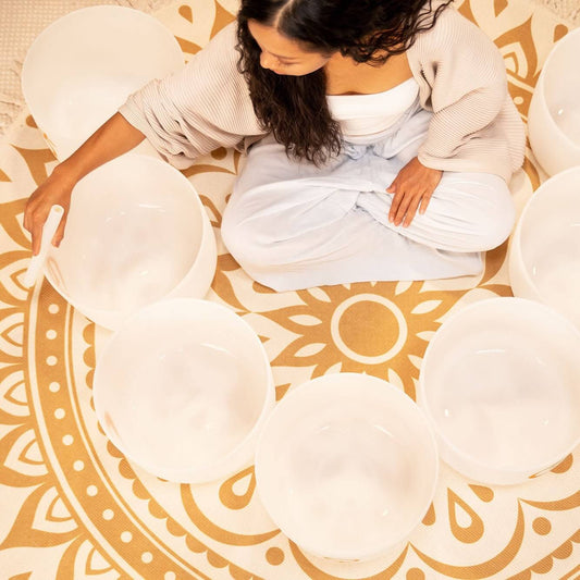 Experience the celestial harmony of the Planetary-Tuned Chakra Set of the Seven Large 12-inch White Frosted Quartz Singing Bowls, meticulously crafted based on Hans Cousto's calculations (author of "The Cosmic Octave") to match the frequencies of the sun,