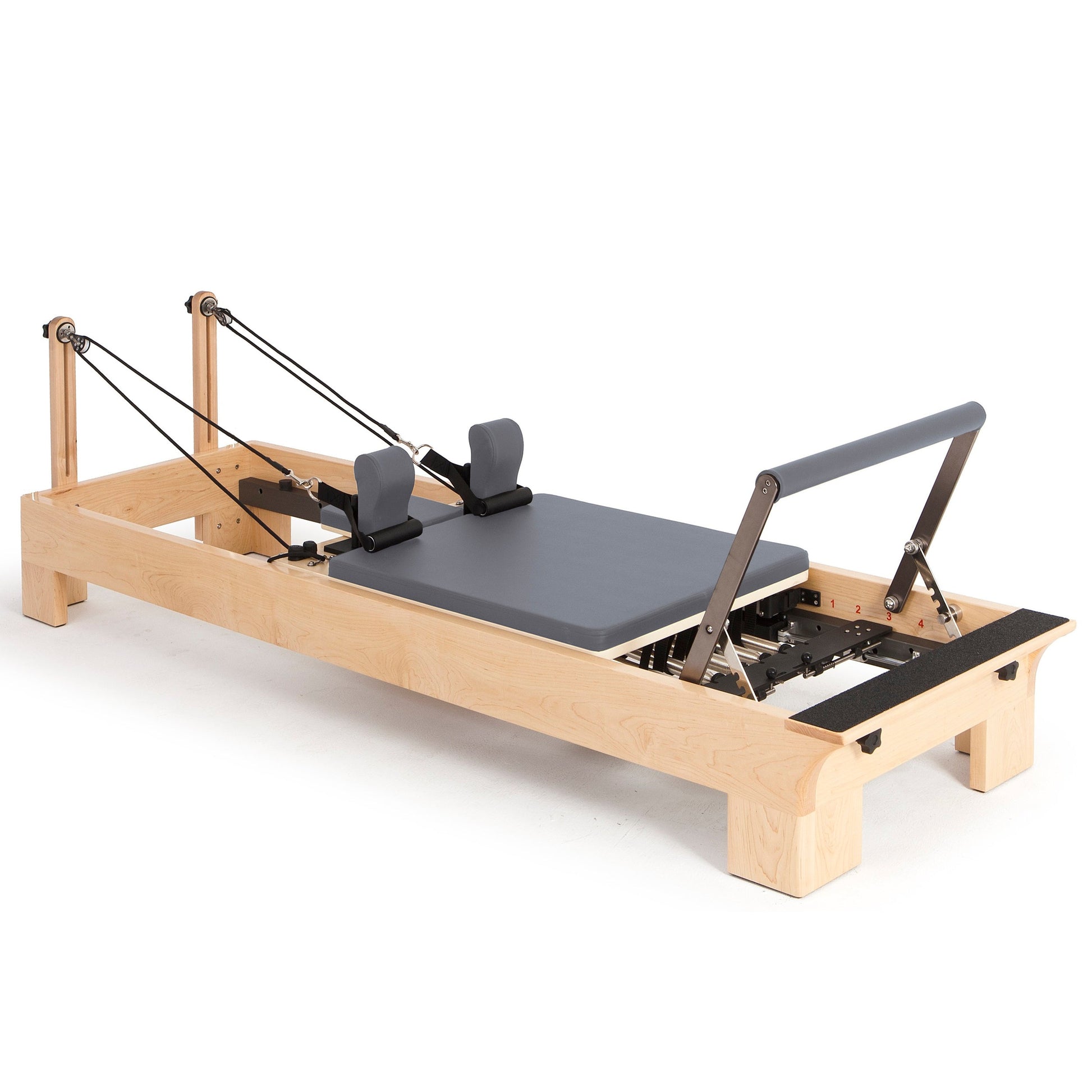 The first Reformer from Elina Pilates, distinguished for its remarkable advancements, is a dynamic and comfortable machine, ideal for studios seeking the warmth provided by wood. Made of rock maple and stainless steel, it ensures exceptional stability and