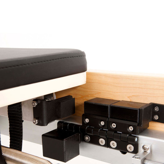 The first Reformer from Elina Pilates, distinguished for its remarkable advancements, is a dynamic and comfortable machine, ideal for studios seeking the warmth provided by wood. Made of rock maple and stainless steel, it ensures exceptional stability and
