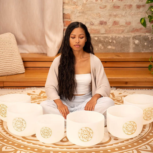 Discover the power of ancient Solfeggio frequencies (Ut, Re, Mi, Fa, Sol, La) with this exquisite set of 6 white-frosted Crystal Quartz Singing Bowls. Each bowl is carefully crafted from high-purity quartz and tuned to promote healing, balance, and well-b