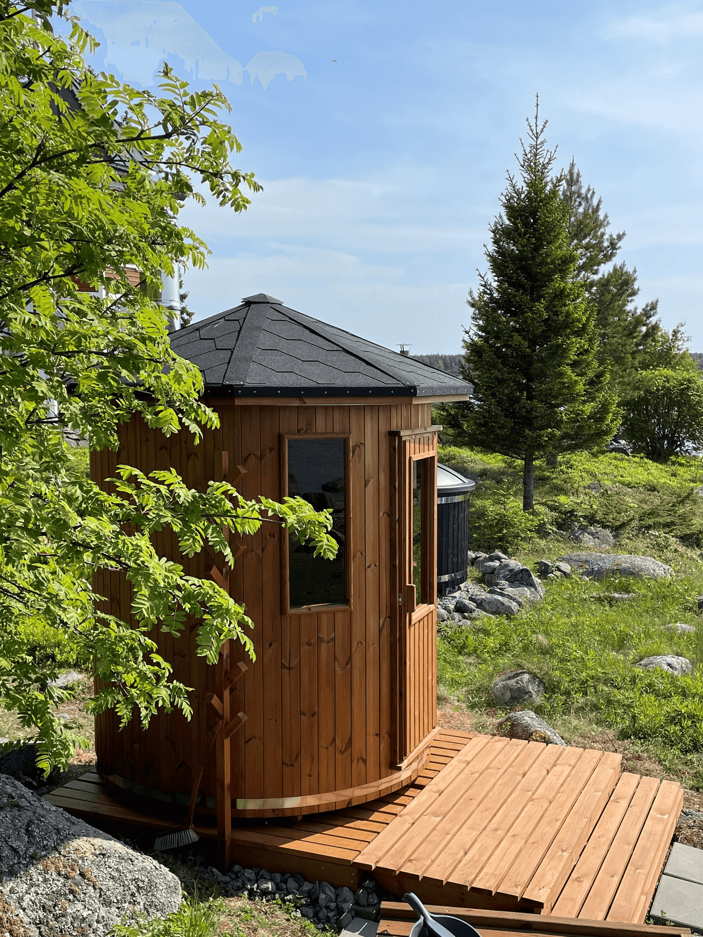 Experience the charm of our wooden cabin sauna, designed with you in mind. This compact yet spacious circular sauna is a versatile gem that can easily find its place in any corner of your garden. It's not just a sauna; it's your personal oasis. Key Featur