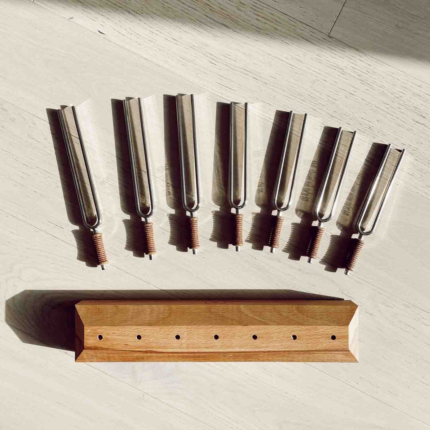 Tune in all seven chakras with this special 7-tuning fork set - it helps you to balance and increase positive energy! A professional set for meditation, yoga, therapeutics, sound healing and spiritual practices. Made from strong steel (not soft aluminum)!