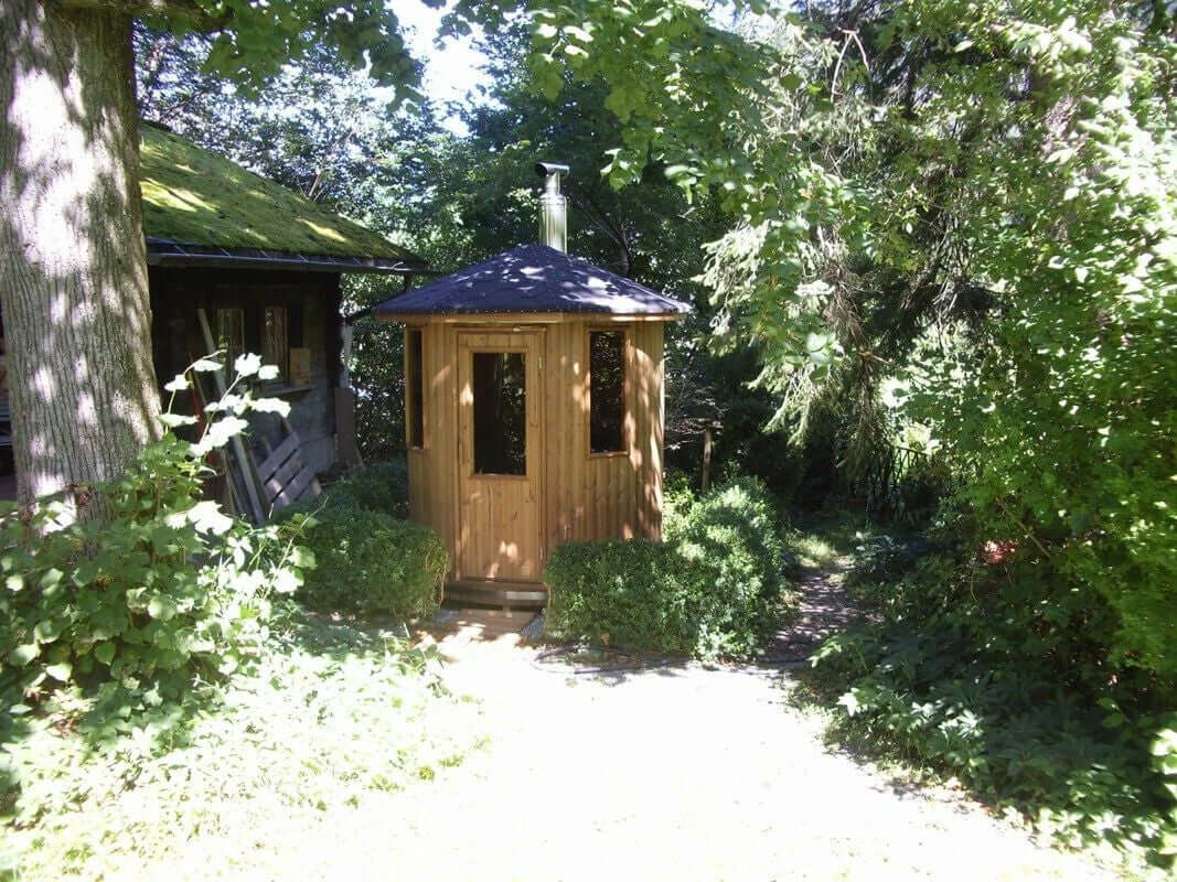 Experience the charm of our wooden cabin sauna, designed with you in mind. This compact yet spacious circular sauna is a versatile gem that can easily find its place in any corner of your garden. It's not just a sauna; it's your personal oasis. Key Featur