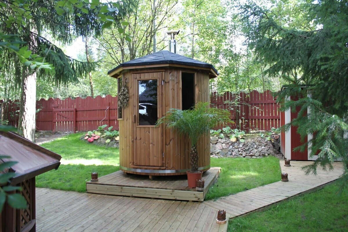 Experience the charm of our wooden cabin sauna, designed with you in mind. This compact yet spacious circular sauna is a versatile gem that can easily find its place in any corner of your garden. It's not just a sauna; it's your personal oasis. Key Featur