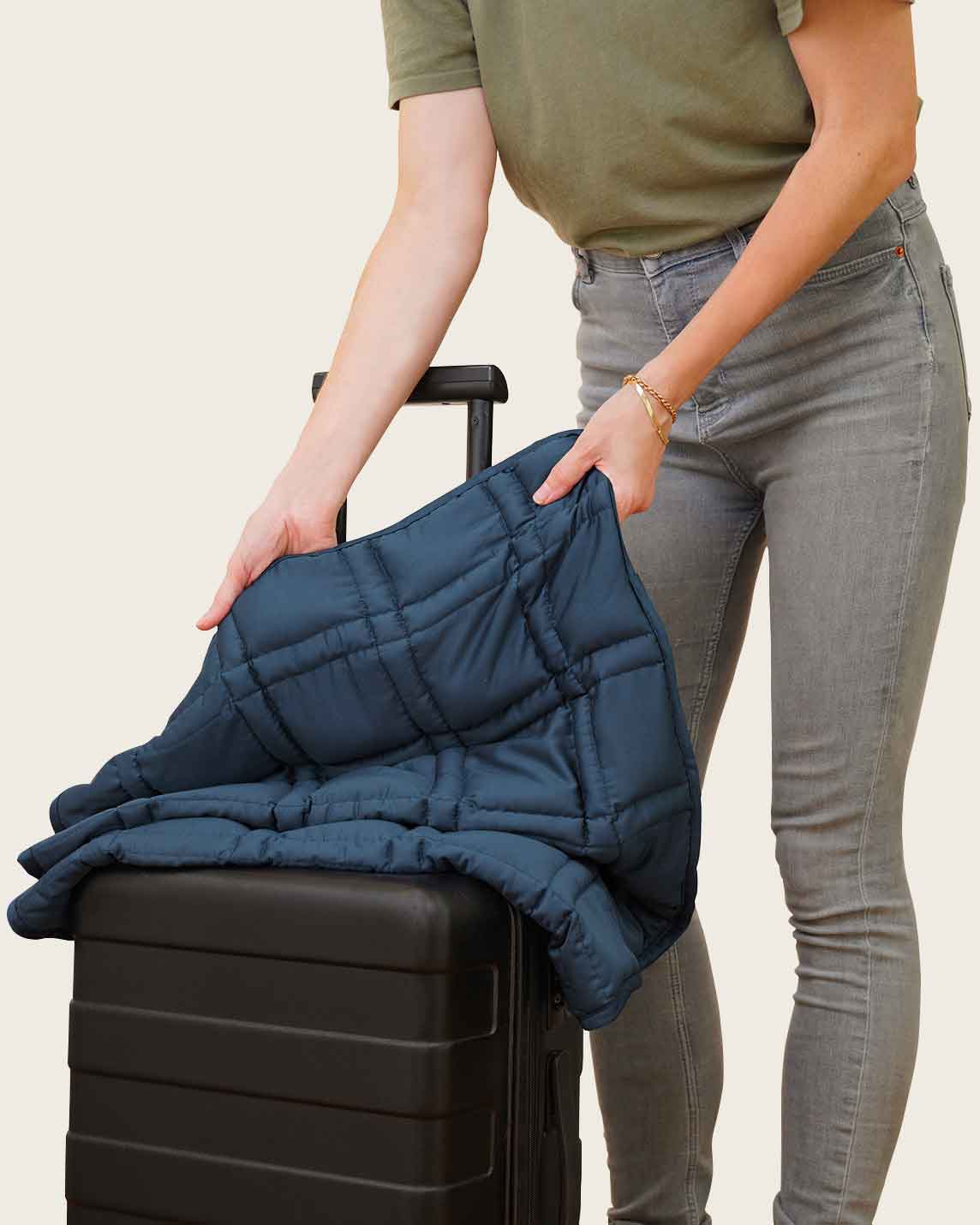 The gentle benefits of a weighted blanket in a compact size! Place it on your lap for better focus while working, on-the-go comfort traveling, or across your body after yoga for a next level savasana. Optional cover has a simple sham closure and connectiv