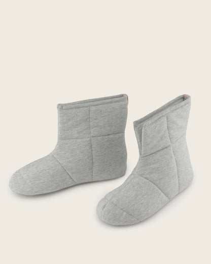 Soft quilted booties that feel like a dream, and look like one too. Lightweight & super soft, these pull-up booties were designed to keep you warm and cozy from dawn to dusk. Lightweight, non-skid sole.