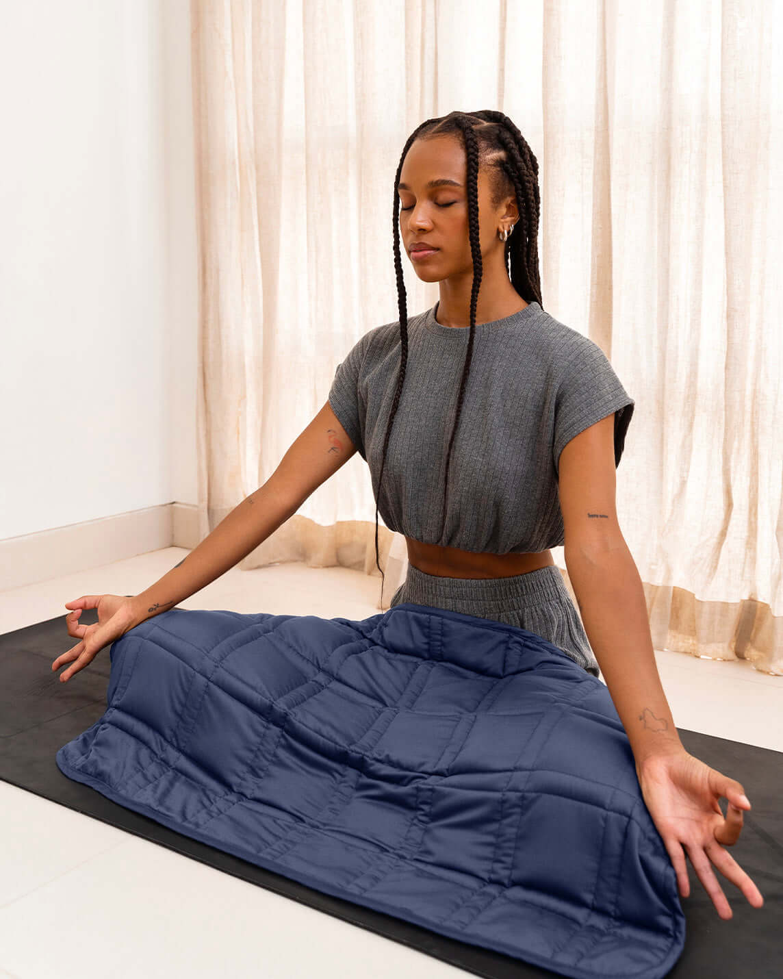 The gentle benefits of a weighted blanket in a compact size! Place it on your lap for better focus while working, on-the-go comfort traveling, or across your body after yoga for a next level savasana. Optional cover has a simple sham closure and connectiv