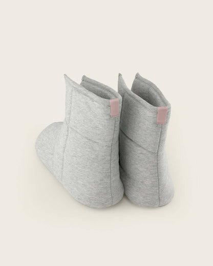 Soft quilted booties that feel like a dream, and look like one too. Lightweight & super soft, these pull-up booties were designed to keep you warm and cozy from dawn to dusk. Lightweight, non-skid sole.
