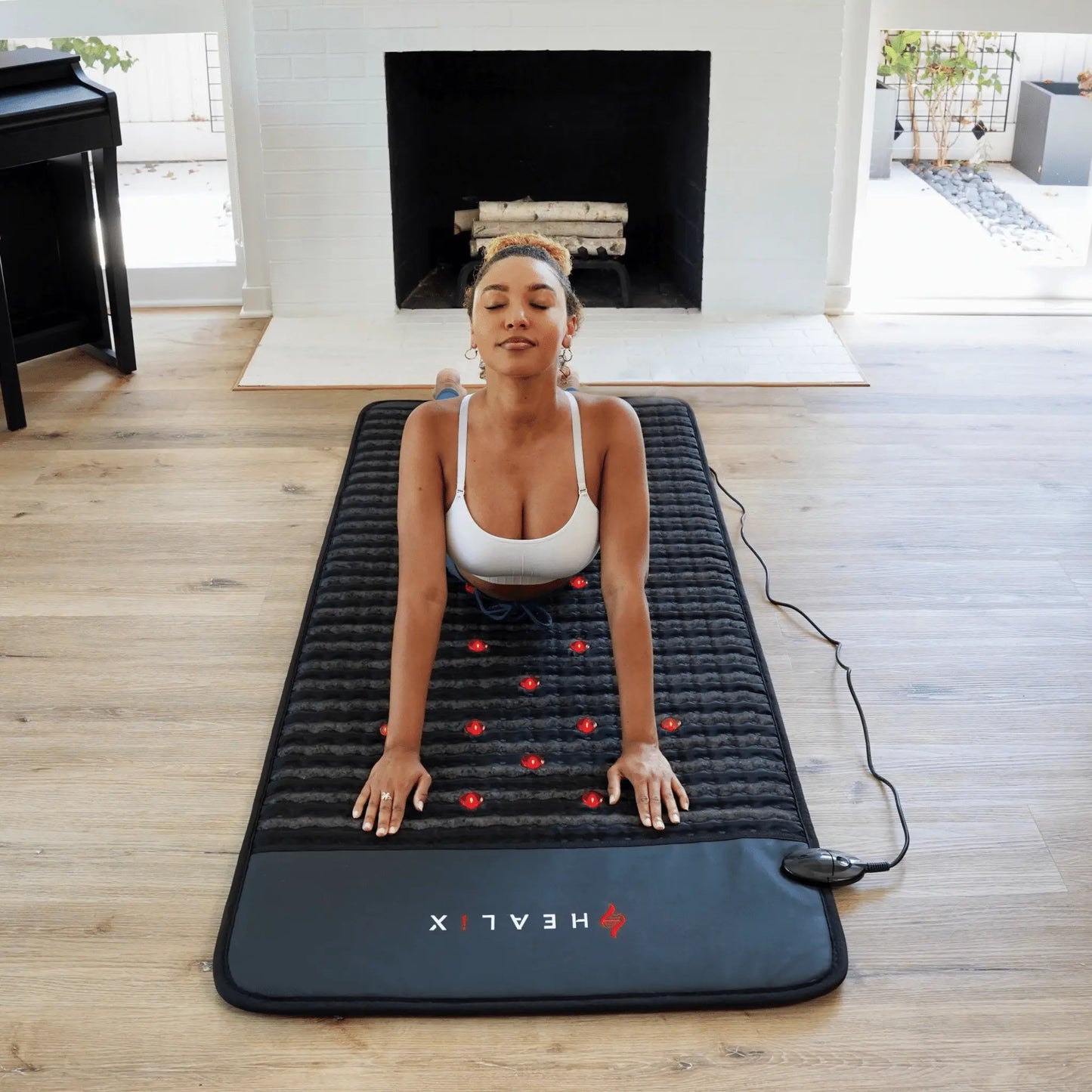 The HEALiX Revive PEMF Mat brings together three of the most risk free and prominent holistic healing technologies to create the Ultimate Trifecta. The Revive takes our expertly engineered Infrared Technology and combines it with PEMF & Red Light Therapy