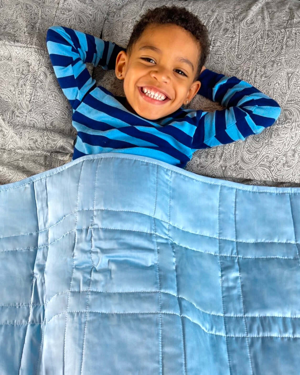 The Baloo Mini feels like a gentle hug, making bedtime and naptime a breeze for kids and adults! The cool and breathable designs are chemical-free and 100% cotton, with a gentle weight that they'll love. Unwind after a long or exciting day with a natural