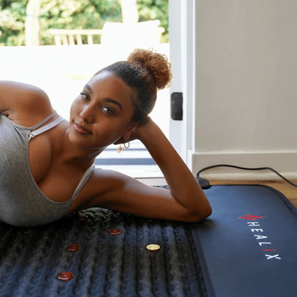 The HEALiX Revive PEMF Mat brings together three of the most risk free and prominent holistic healing technologies to create the Ultimate Trifecta. The Revive takes our expertly engineered Infrared Technology and combines it with PEMF & Red Light Therapy
