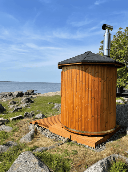 Experience the charm of our wooden cabin sauna, designed with you in mind. This compact yet spacious circular sauna is a versatile gem that can easily find its place in any corner of your garden. It's not just a sauna; it's your personal oasis. Key Featur