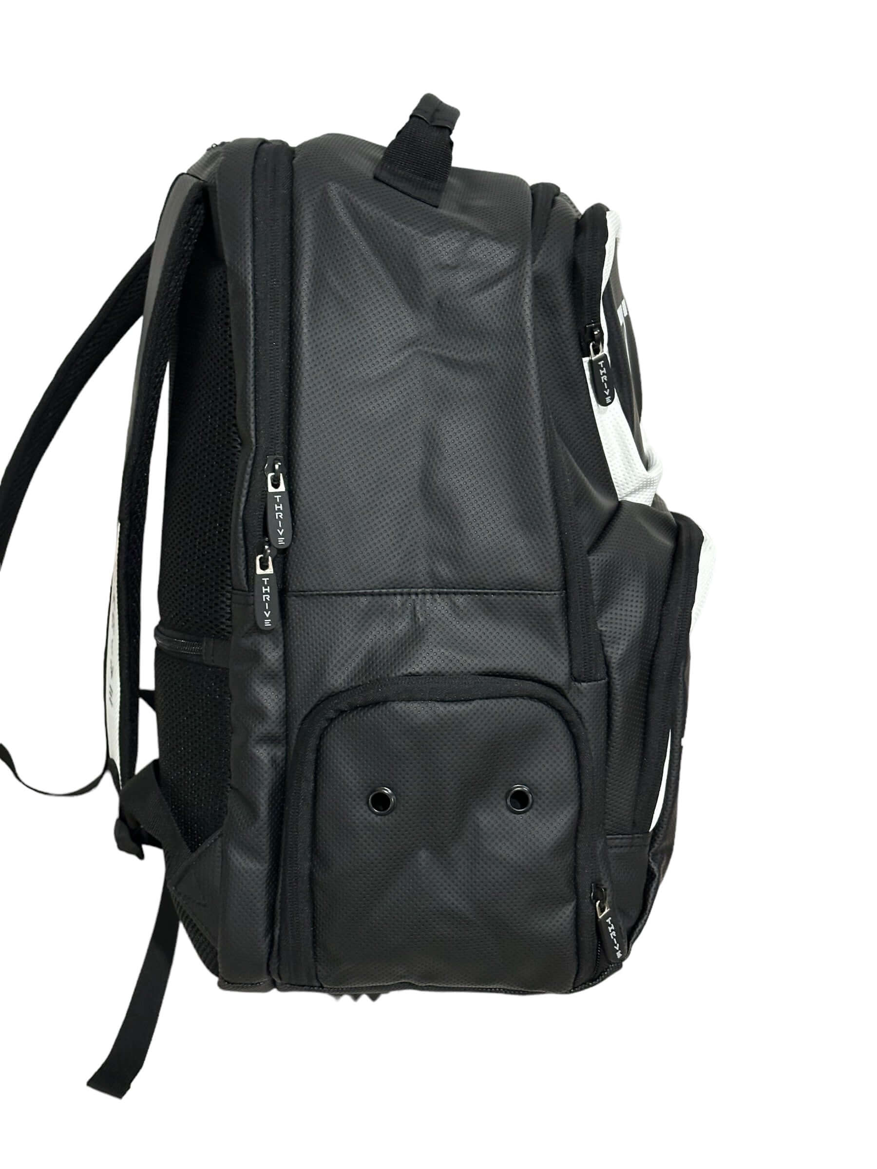 Thrive Elite Backpack is made of 100% vegan leather and designed for the player who prefers using a smaller backpack then our Tour Bag. This backpack still maintains a stylish and sleek look while having all the functionality of would expect. This backpac
