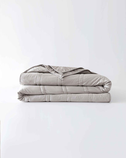 The Baloo weighted comforter molds to your body like a gentle hug, enveloping the entire bed in a cozy, comfy cocoon. Science-backed and sustainably-made, in super-soft washable cotton, the comforter's larger size makes it ideal for sharing.
