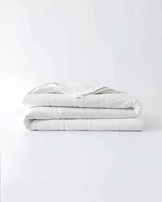 The Baloo weighted comforter molds to your body like a gentle hug, enveloping the entire bed in a cozy, comfy cocoon. Science-backed and sustainably-made, in super-soft washable cotton, the comforter's larger size makes it ideal for sharing.