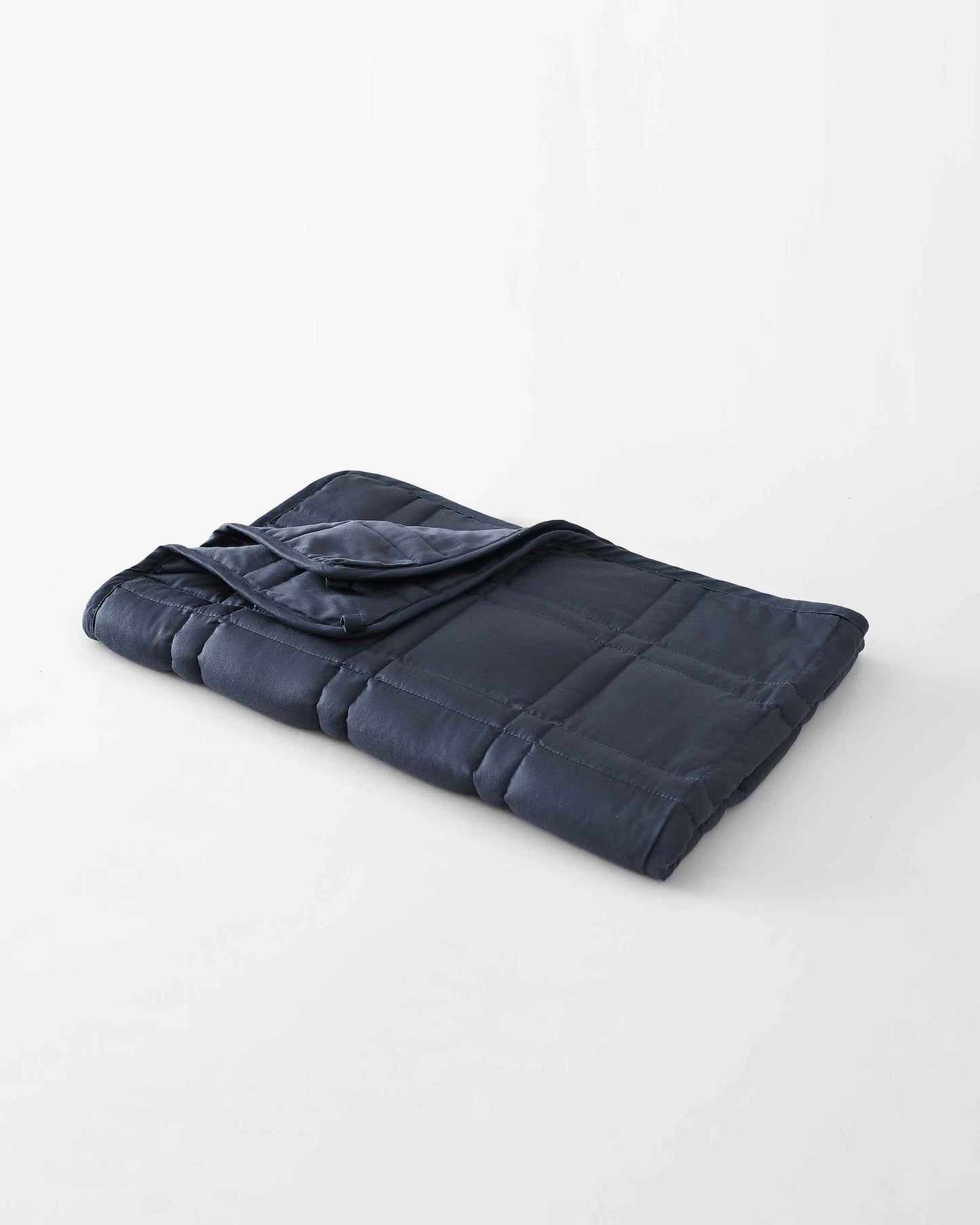 The gentle benefits of a weighted blanket in a compact size! Place it on your lap for better focus while working, on-the-go comfort traveling, or across your body after yoga for a next level savasana. Optional cover has a simple sham closure and connectiv