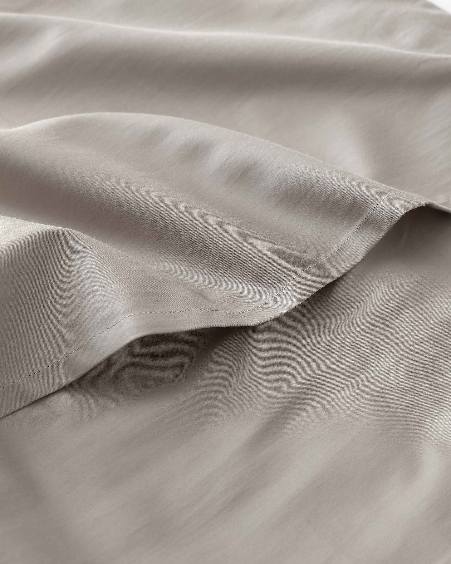 The gentle benefits of a weighted blanket in a compact size! Place it on your lap for better focus while working, on-the-go comfort traveling, or across your body after yoga for a next level savasana. Optional cover has a simple sham closure and connectiv