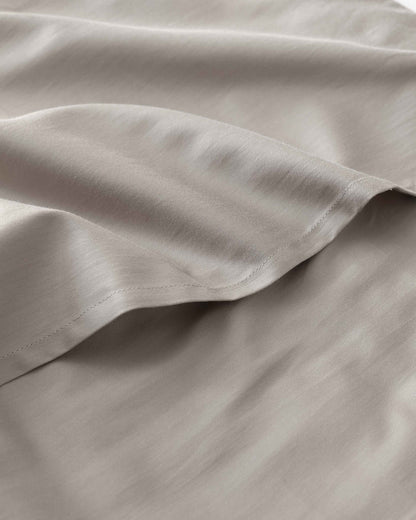 The gentle benefits of a weighted blanket in a compact size! Place it on your lap for better focus while working, on-the-go comfort traveling, or across your body after yoga for a next level savasana. Optional cover has a simple sham closure and connectiv