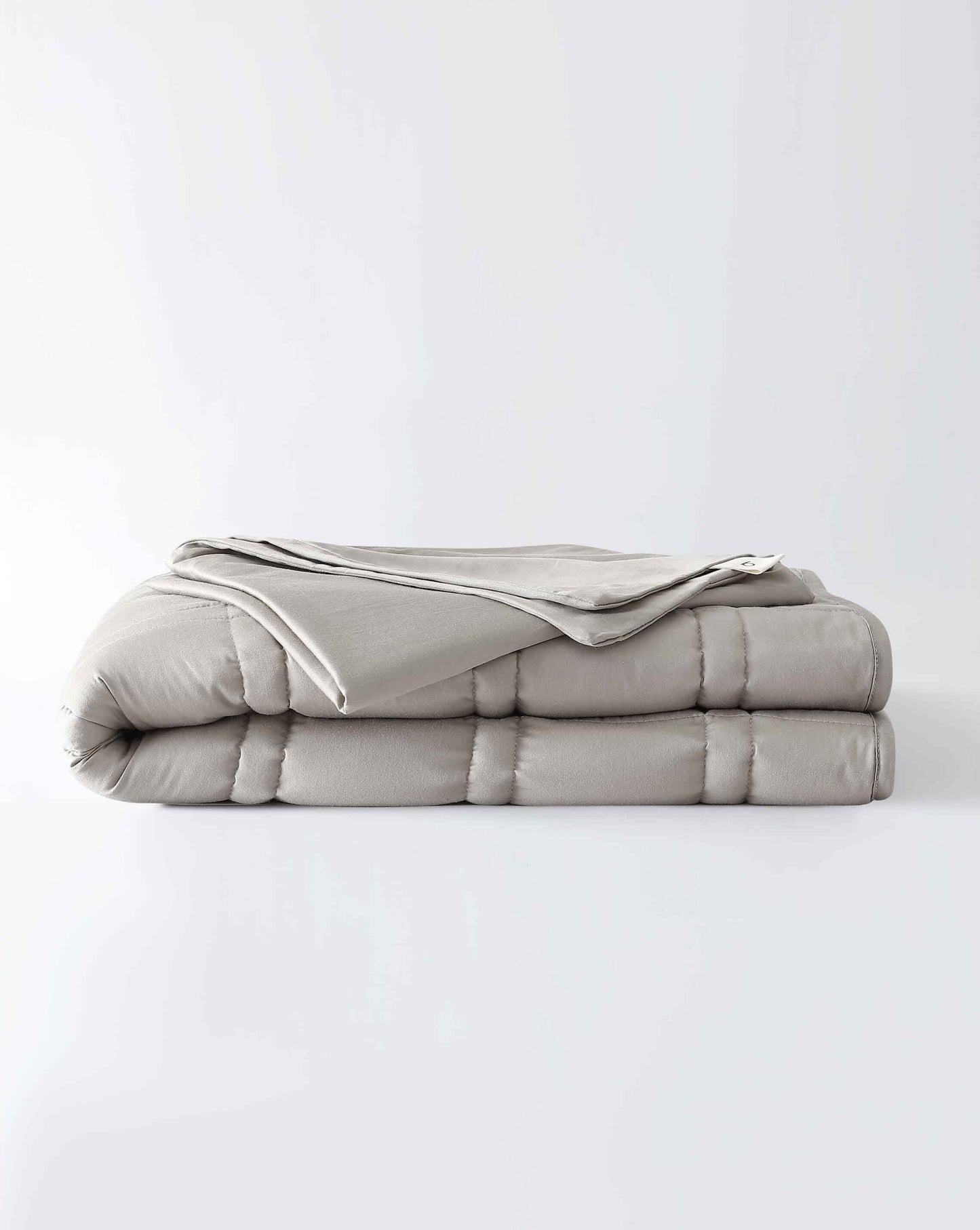 The gentle benefits of a weighted blanket in a compact size! Place it on your lap for better focus while working, on-the-go comfort traveling, or across your body after yoga for a next level savasana. Optional cover has a simple sham closure and connectiv