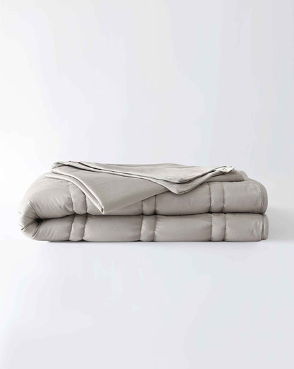 The gentle benefits of a weighted blanket in a compact size! Place it on your lap for better focus while working, on-the-go comfort traveling, or across your body after yoga for a next level savasana. Optional cover has a simple sham closure and connectiv