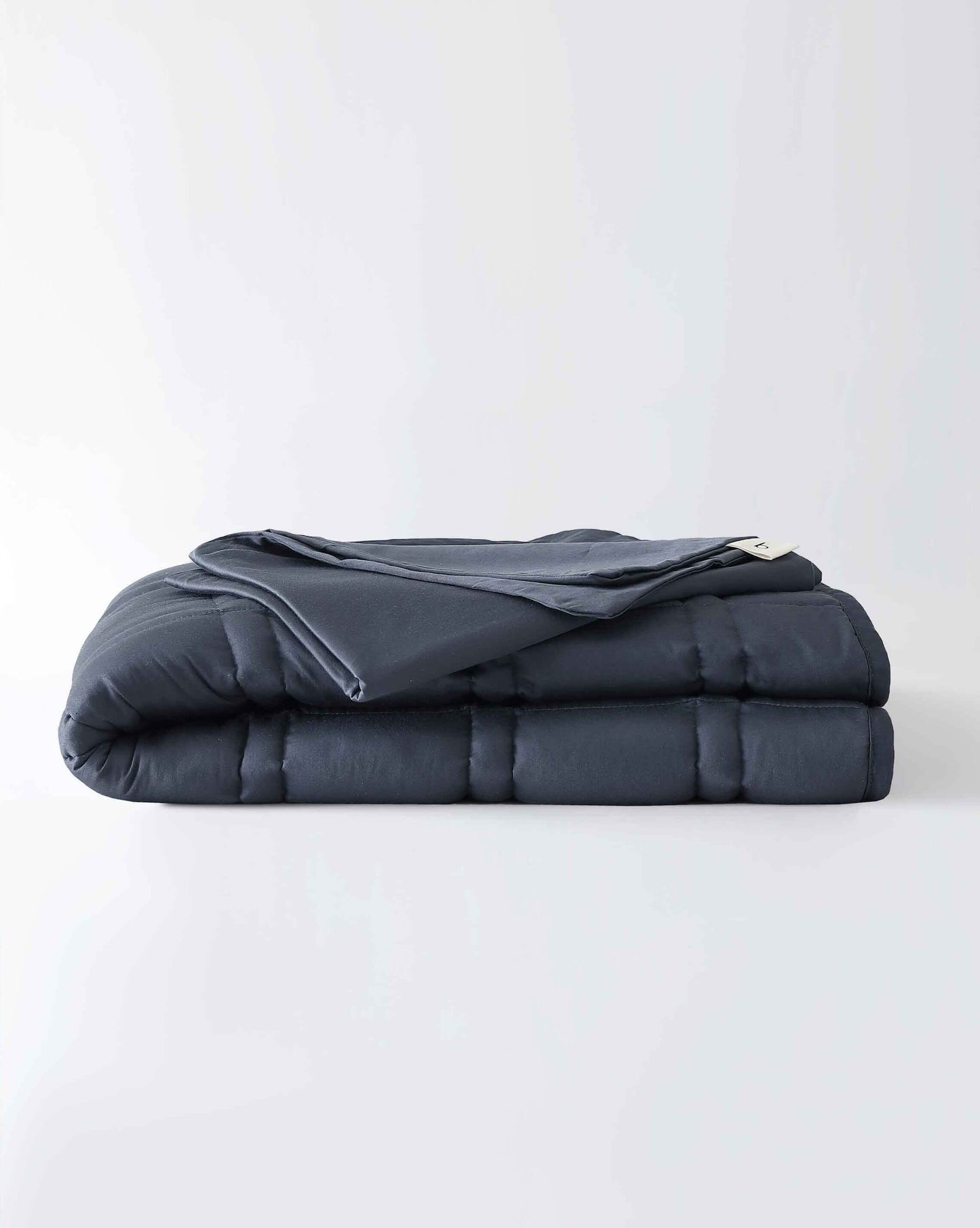 The gentle benefits of a weighted blanket in a compact size! Place it on your lap for better focus while working, on-the-go comfort traveling, or across your body after yoga for a next level savasana. Optional cover has a simple sham closure and connectiv