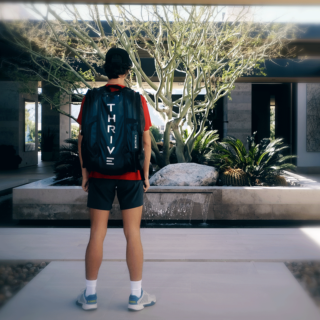 Thrive Elite Pro Tour Bag is made of 100% vegan leather and designed for the player who wants to look good and travel to the courts in style. This bag has room for all your paddles and accessories and doubles as carry-on luggage. The backpack straps have