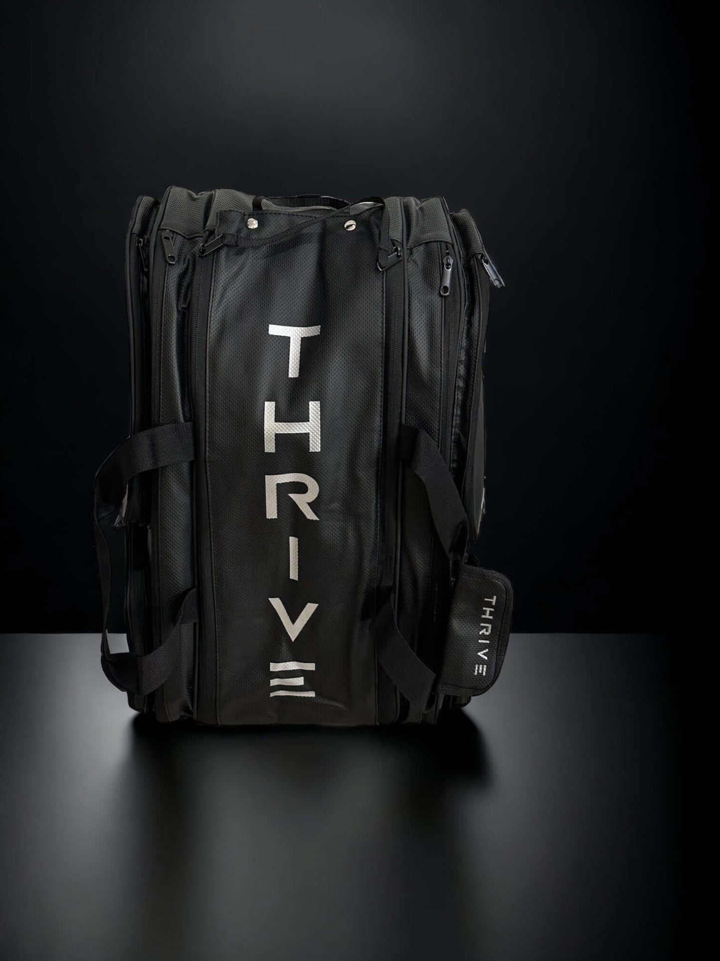 Thrive Elite Pro Tour Bag is made of 100% vegan leather and designed for the player who wants to look good and travel to the courts in style. This bag has room for all your paddles and accessories and doubles as carry-on luggage. The backpack straps have