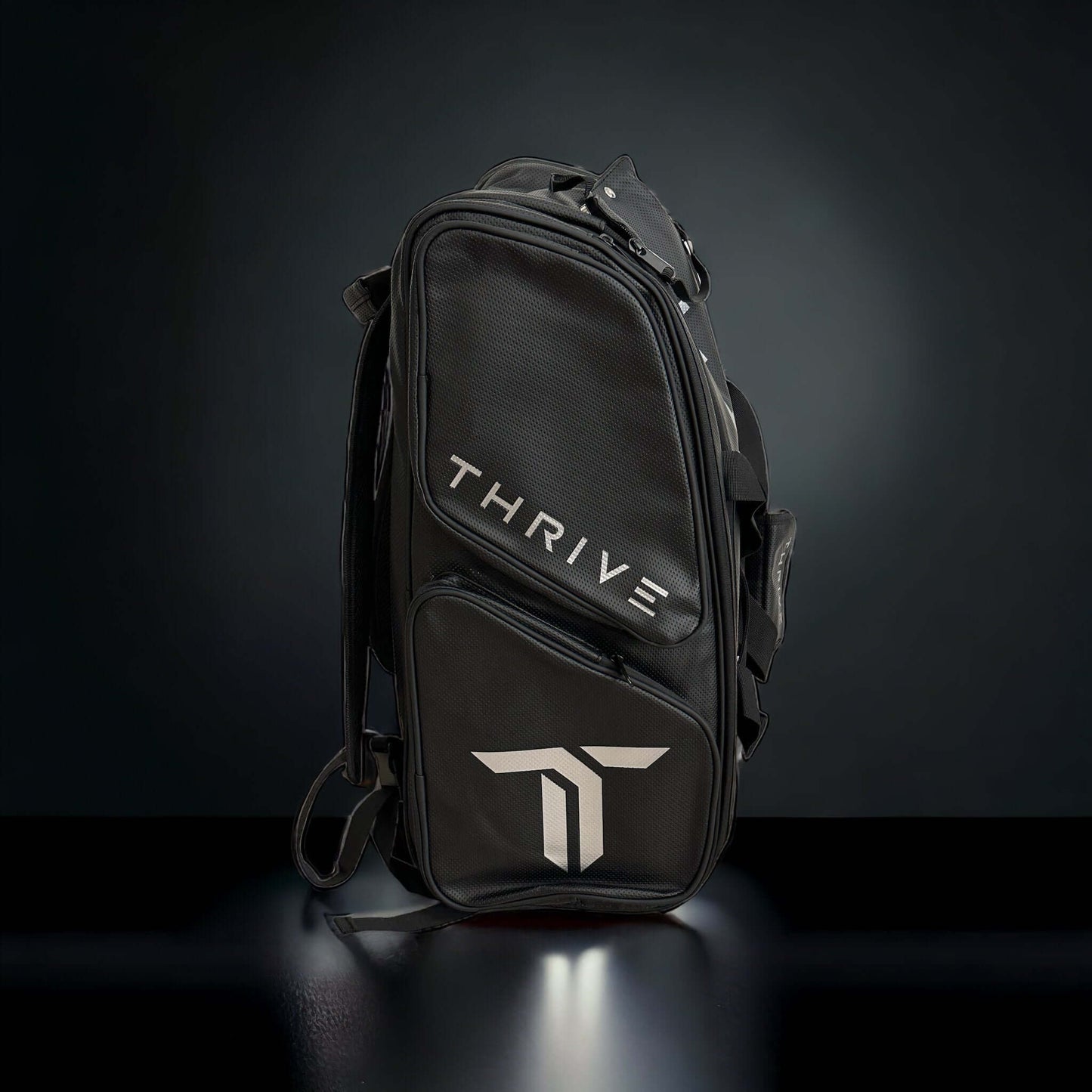 Thrive Elite Pro Tour Bag is made of 100% vegan leather and designed for the player who wants to look good and travel to the courts in style. This bag has room for all your paddles and accessories and doubles as carry-on luggage. The backpack straps have