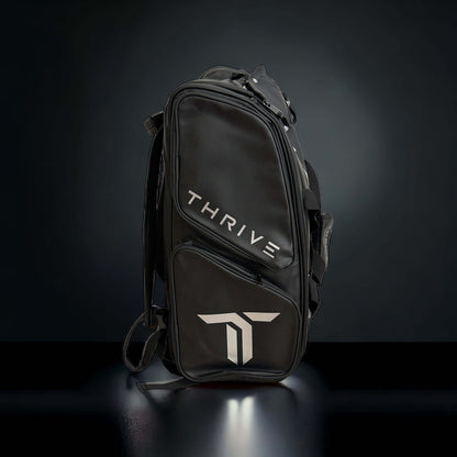 Thrive Elite Pro Tour Bag is made of 100% vegan leather and designed for the player who wants to look good and travel to the courts in style. This bag has room for all your paddles and accessories and doubles as carry-on luggage. The backpack straps have