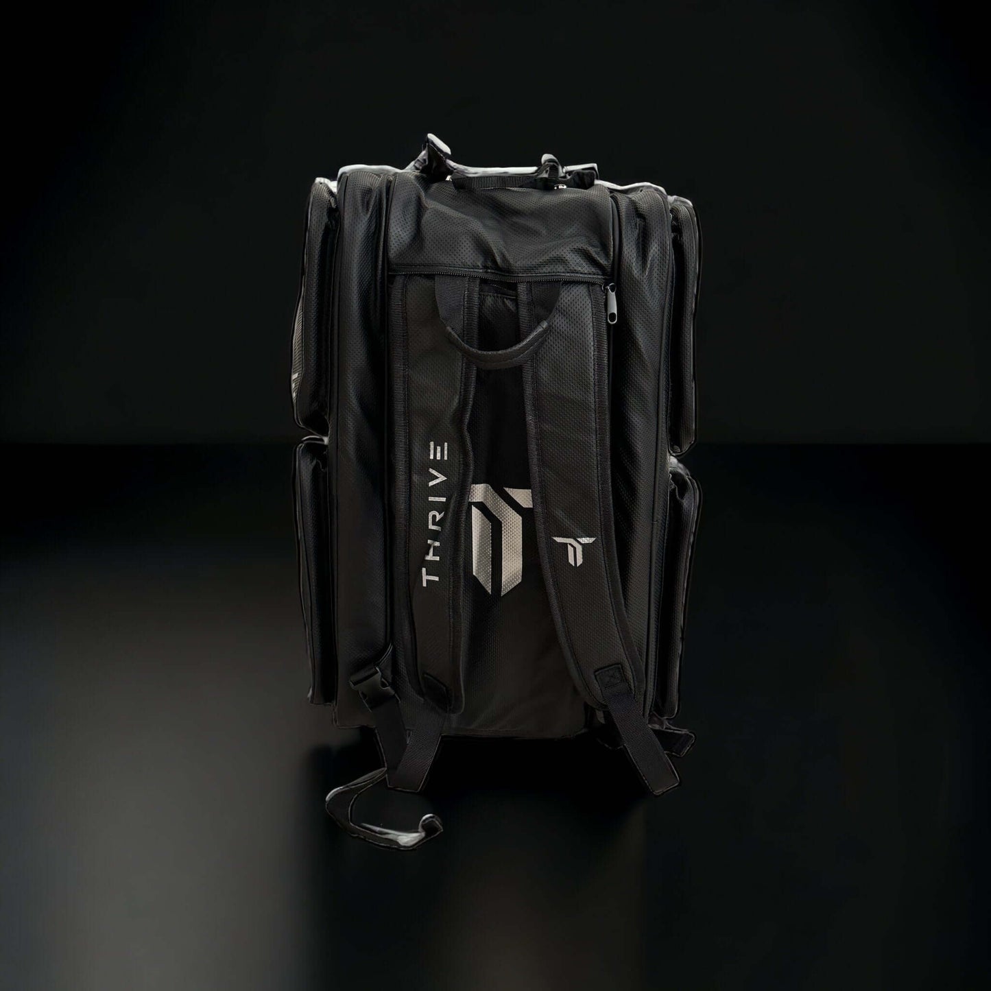 Thrive Elite Pro Tour Bag is made of 100% vegan leather and designed for the player who wants to look good and travel to the courts in style. This bag has room for all your paddles and accessories and doubles as carry-on luggage. The backpack straps have