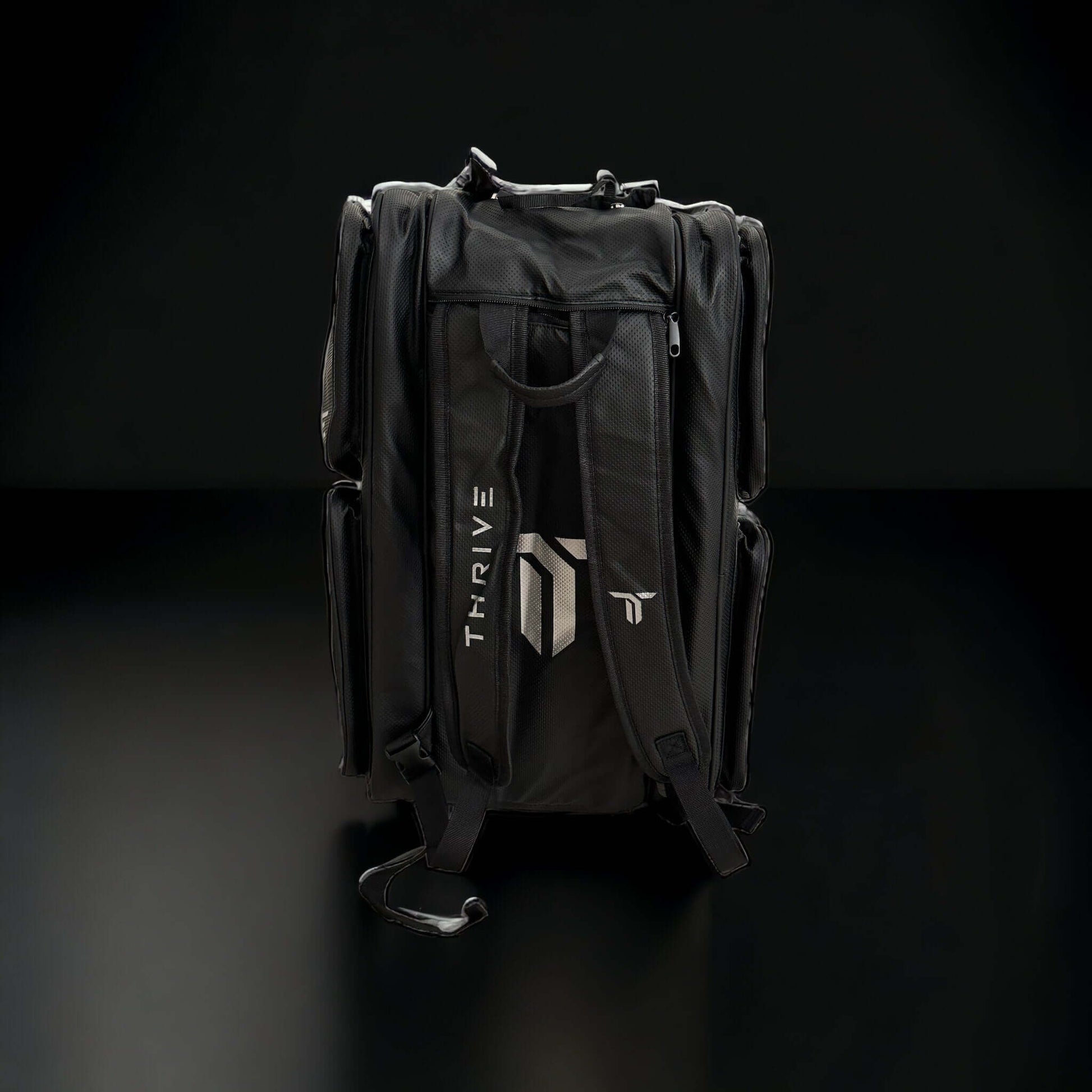 Thrive Elite Pro Tour Bag is made of 100% vegan leather and designed for the player who wants to look good and travel to the courts in style. This bag has room for all your paddles and accessories and doubles as carry-on luggage. The backpack straps have