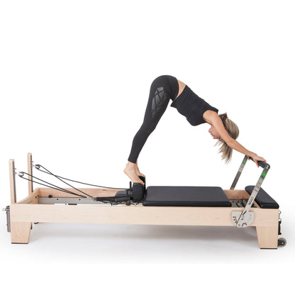 The Elite reformer from Elina Pilates stands out as a high-performance, professional reformer. This very innovative machine is made from rock maple wood and stainless steel metal parts. A distinctive feature of the Elite is its ability to be stacked, very
