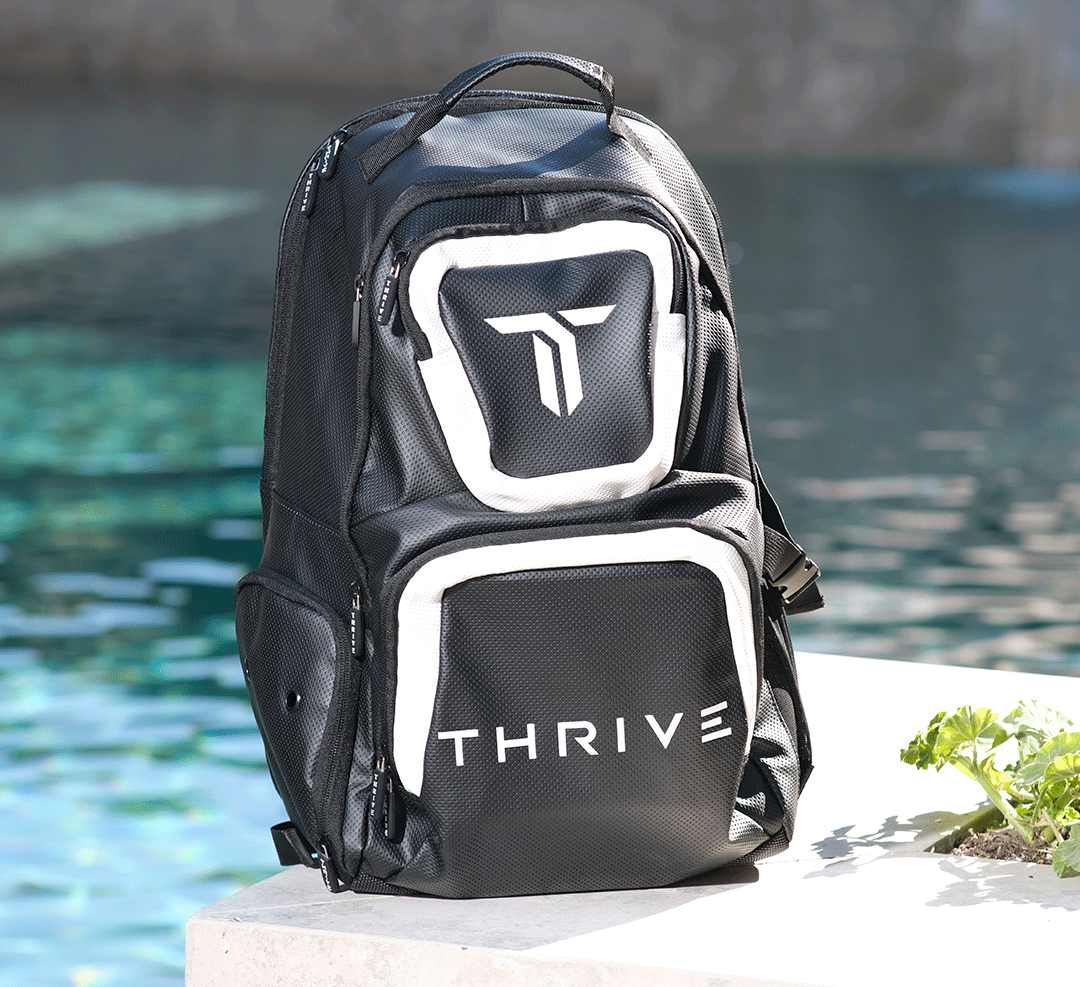 Thrive Elite Backpack is made of 100% vegan leather and designed for the player who prefers using a smaller backpack then our Tour Bag. This backpack still maintains a stylish and sleek look while having all the functionality of would expect. This backpac