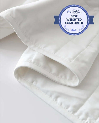 The Baloo weighted comforter molds to your body like a gentle hug, enveloping the entire bed in a cozy, comfy cocoon. Science-backed and sustainably-made, in super-soft washable cotton, the comforter's larger size makes it ideal for sharing.